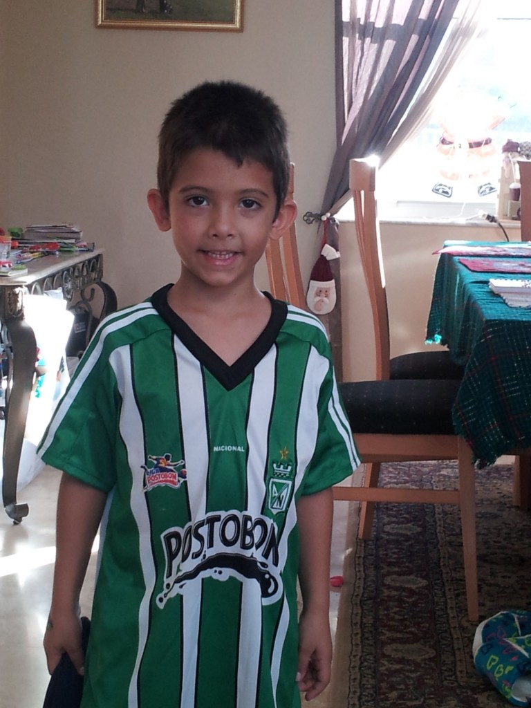 Nephew Ethan sporting his new Nacional soccer jersey