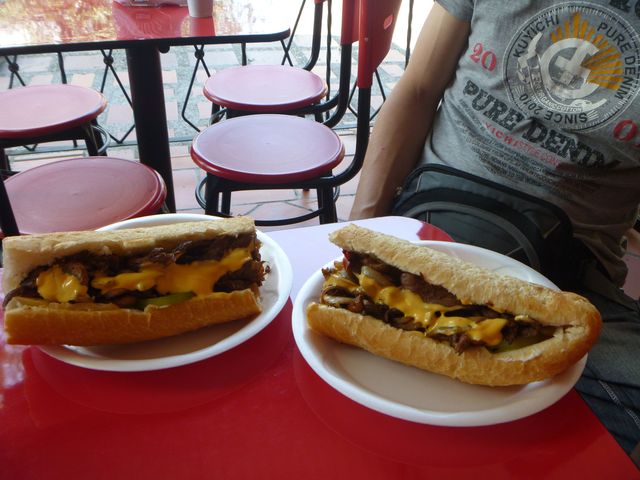 An original philly cheesesteak, and that's just half (because each piece is a quarter).