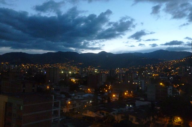 Western Medellín at dusk, a view from the balcony of my friend's Estadio apartment. 