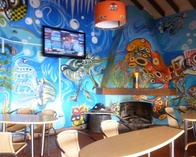 This is one of the more colorful rooms at Mahalo Action Sports Cafe. 