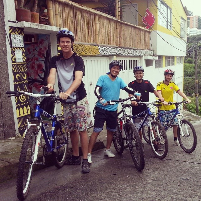 Several travelers join Daniel (far right) on a bike tour of the city. 