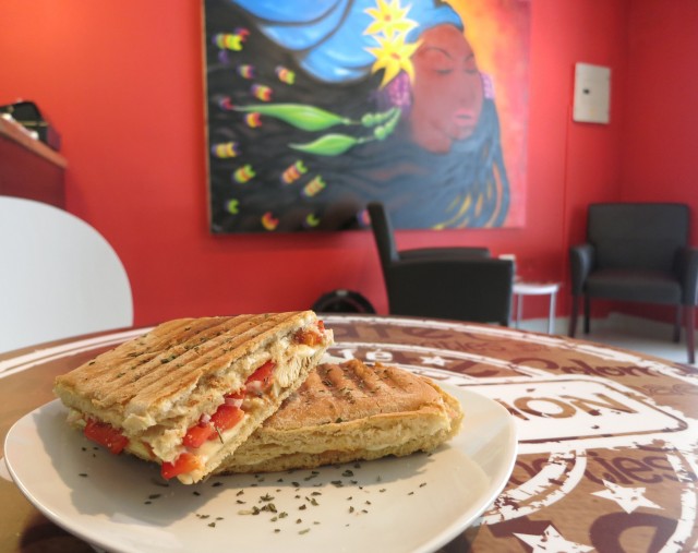 The paninis are great, and so is the art, like the painting called La Negra, the only one not for sale. 