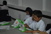 Kids with laptops at the foundation