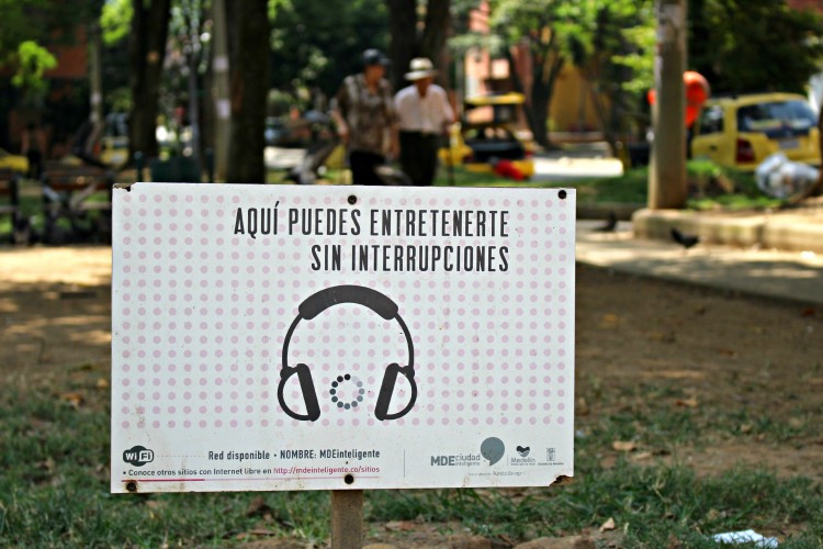 Signs for the public WiFi network provided by Fundación EPM in Parque de La Floresta