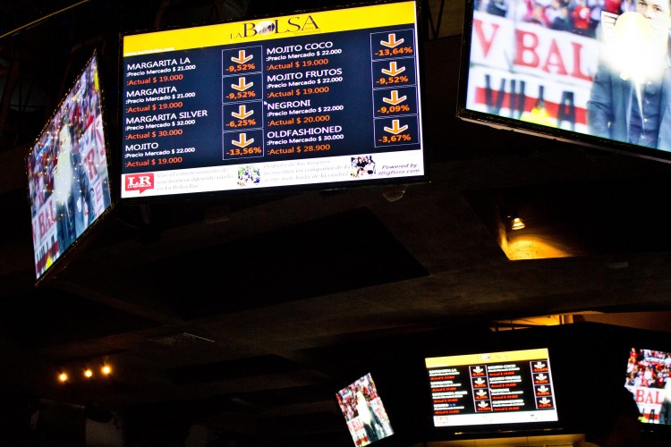 Screens that showed the "crashing" prices of alcohol at the restaurant that night.