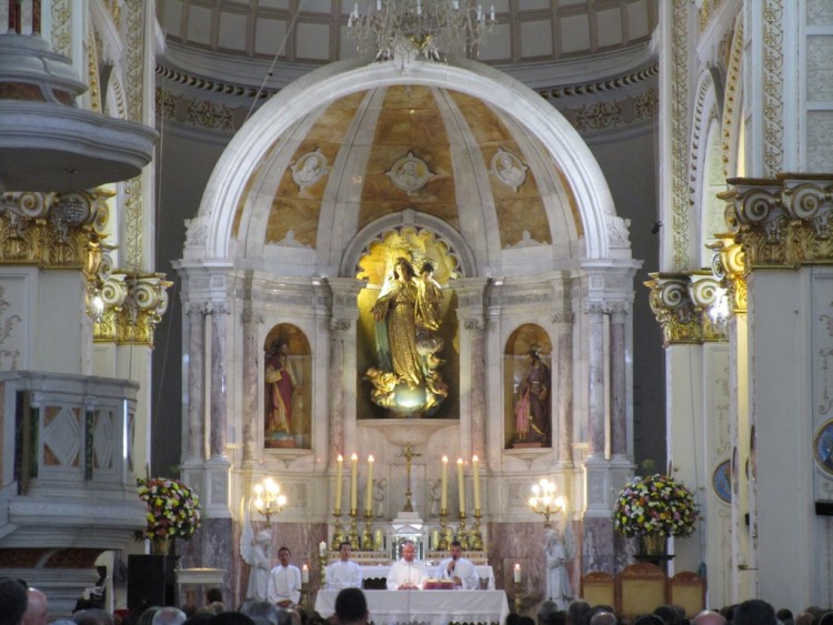 The main altar inside the church during mass