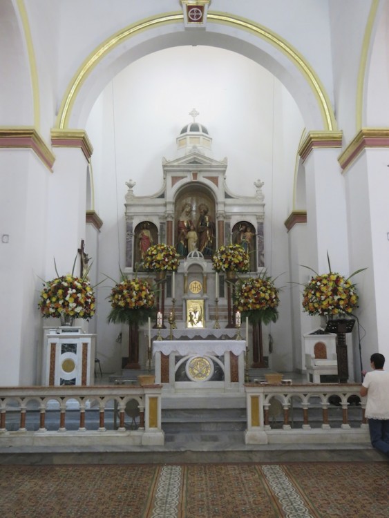 The front of the right aisle in the church