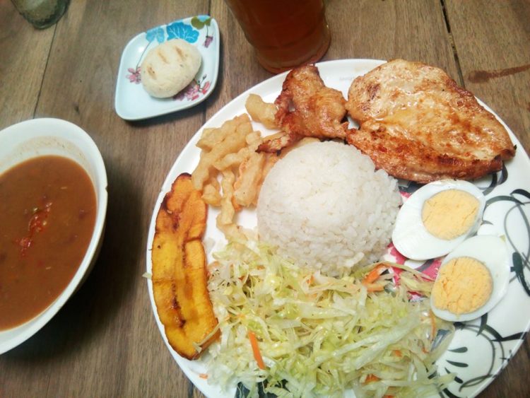Rice, beans, chicken breast, salad, fries, boiled egg, arepa, and guarapo--all included at La Sazon de Maria
