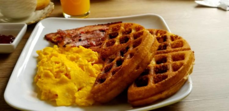 Delicious waffles and eggs to start (or end) your day! (photo courtesy of Sweet Georgia Cafe)