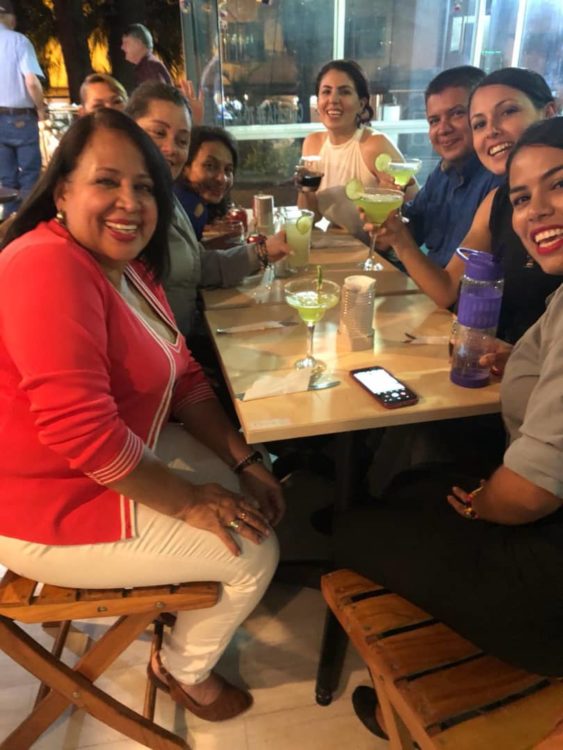 A group of customers enjoying drinks at Philly Sports Bar
