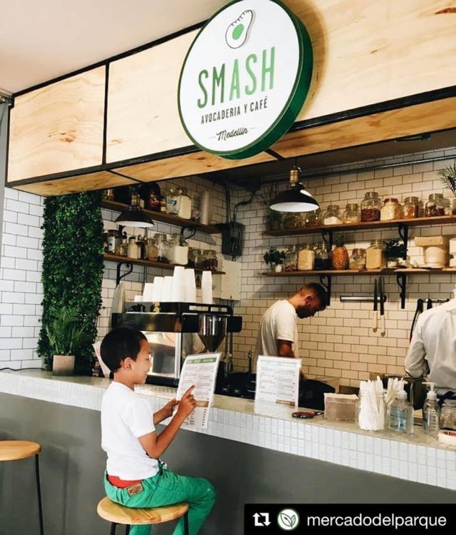 A young diner checking out the menu at Smash Avocaderia