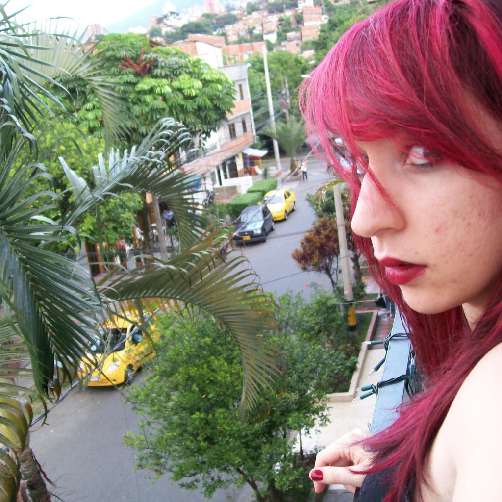 My Red Hair and Nails on My Balcony in Envigado
