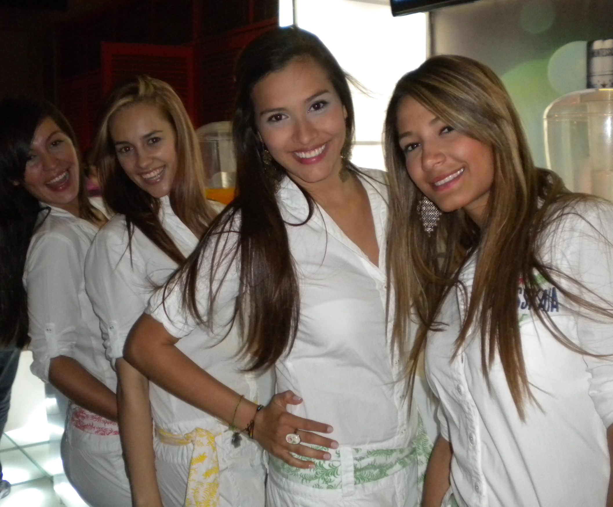 Girls handing out shots