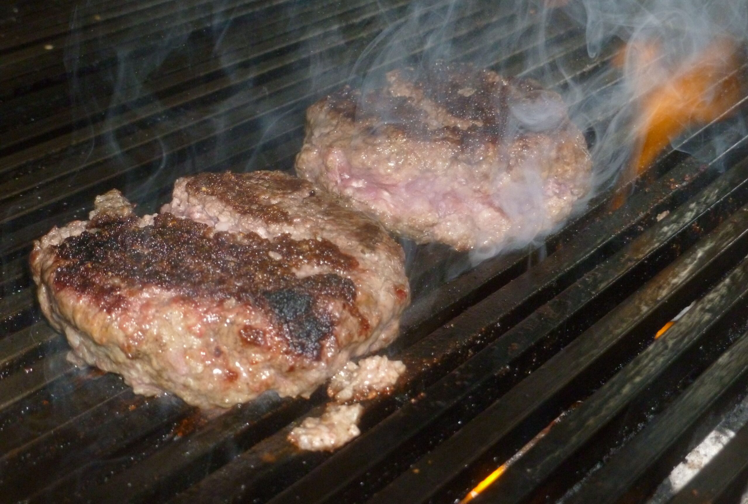 Steven, the owner, rocks the grill at London Burger Kitchen. 