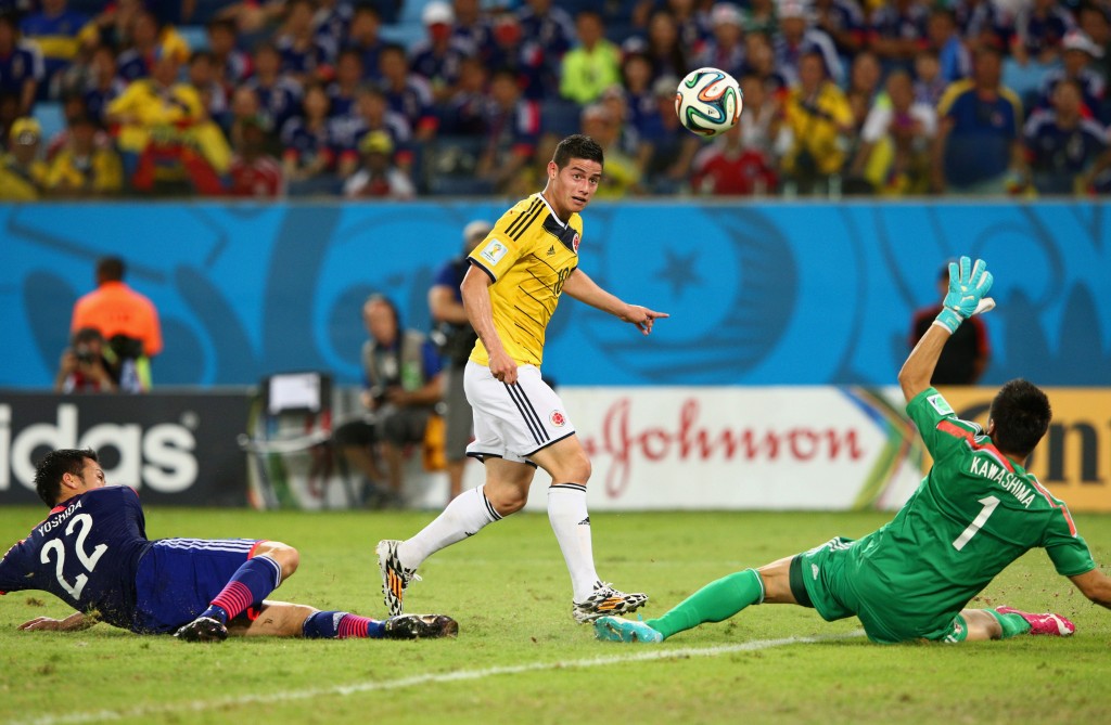 James chips it over the keeper.