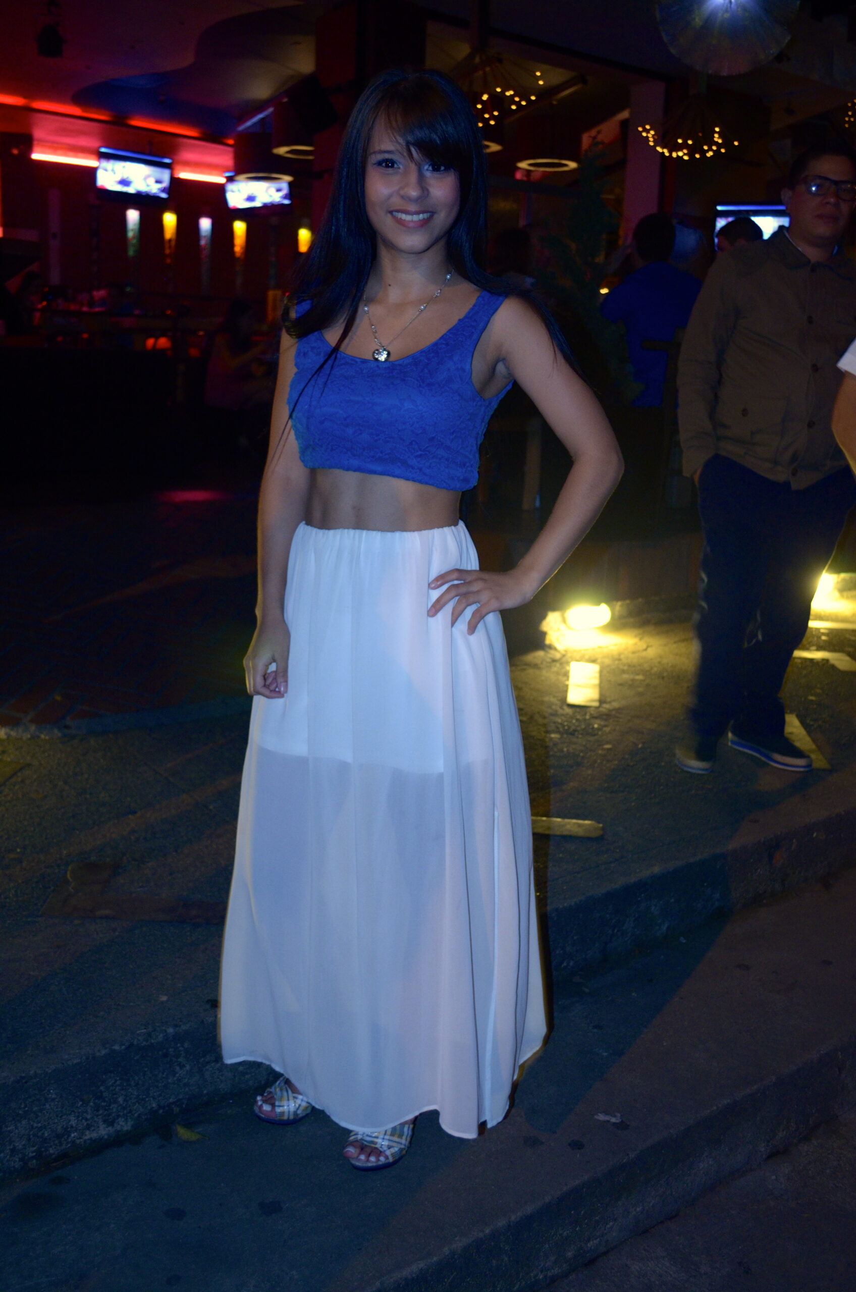 White high waisted maxi skirt, blue crop top.