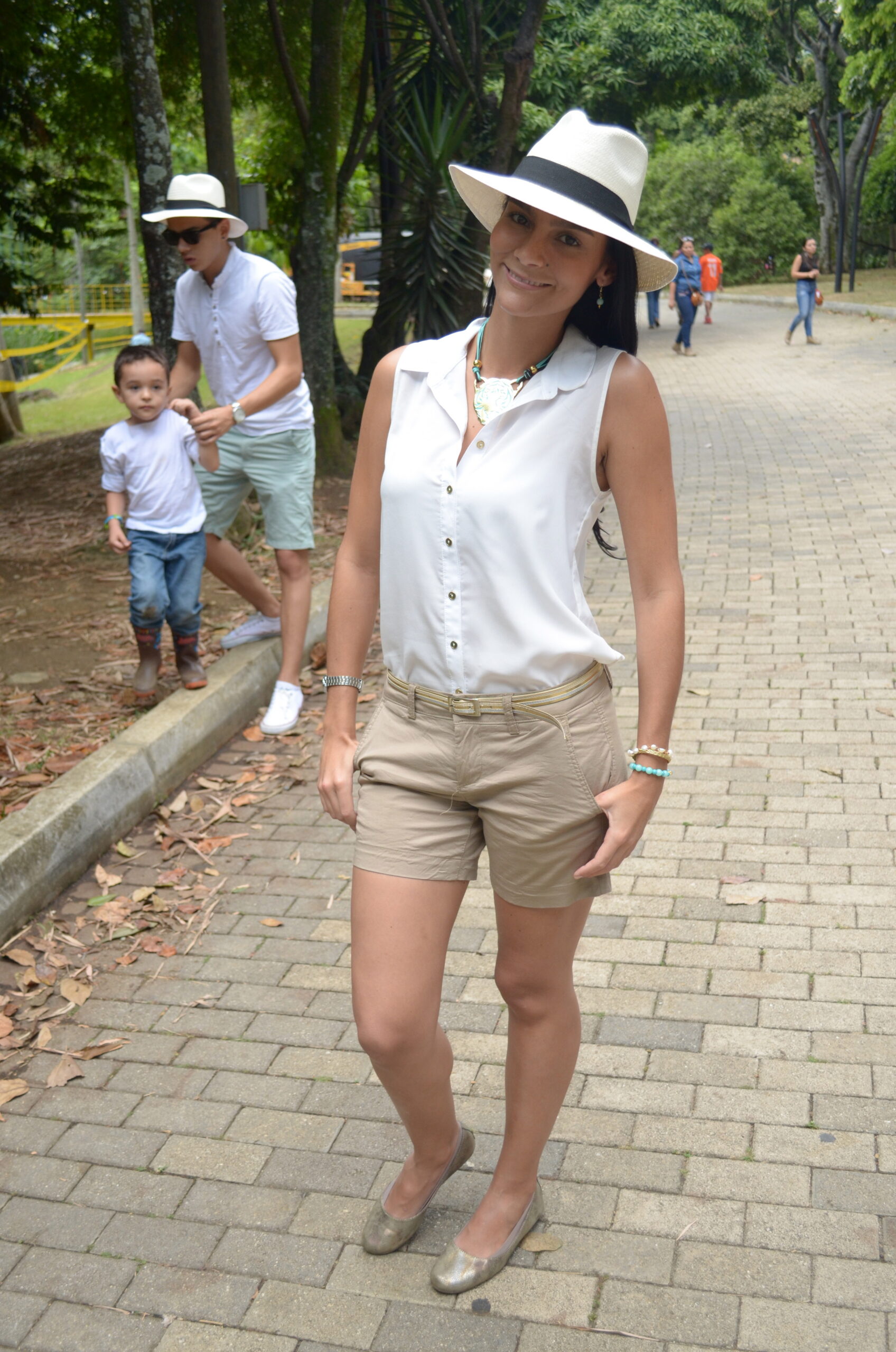 Loose blouse, shorts, and accessories.