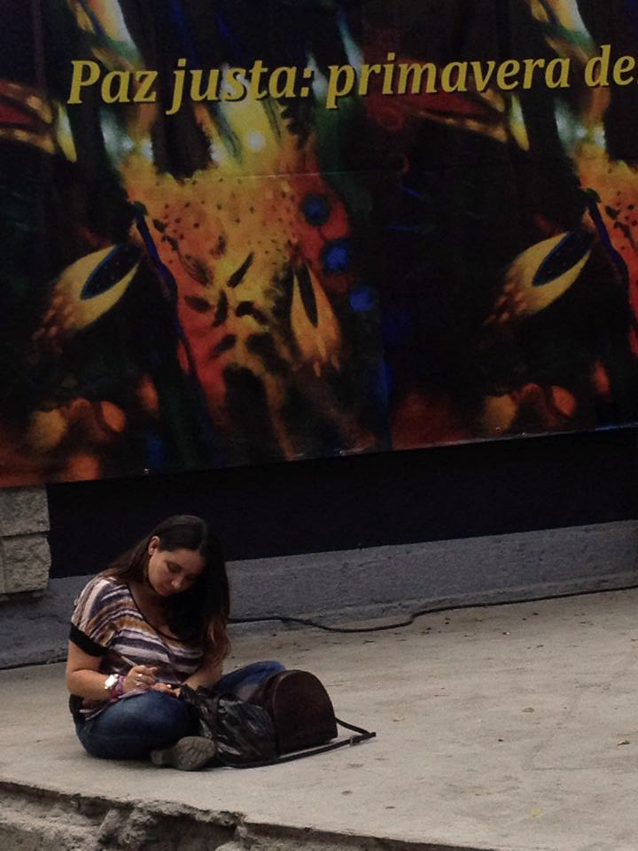 Young girl taking notes on  the event