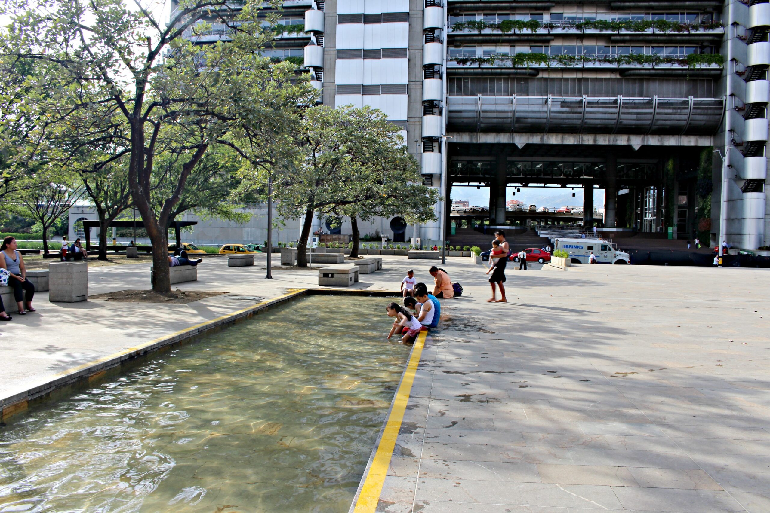 Locals enjoying a wading pool in the plaza