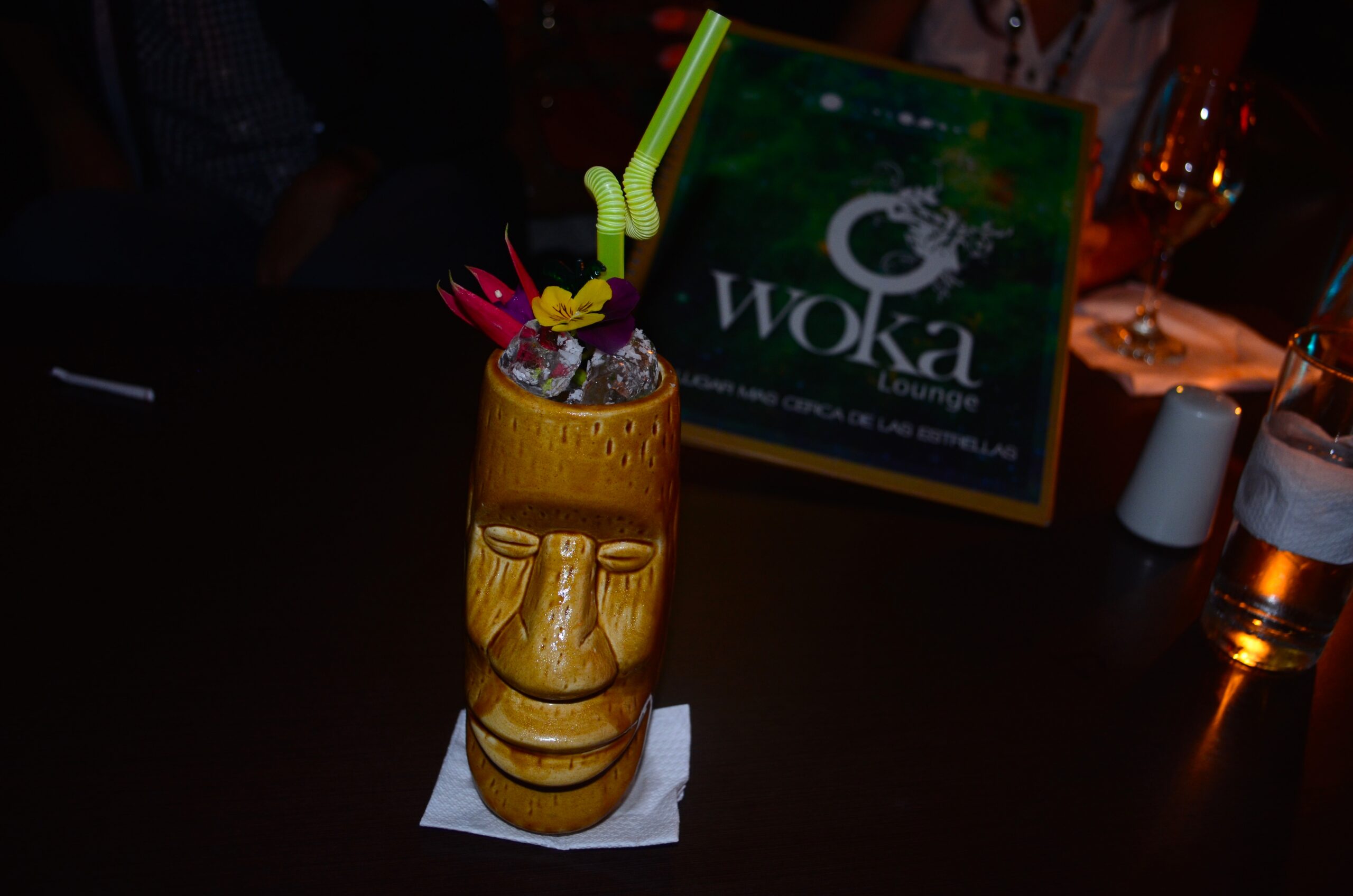 Woka Mai-Tai tiki drink The Woka Mai-Tai tiki drink has rum, Caribbean coco, almond syrup and secret ingredients from the bar. 24,900 pesos ($9.60)