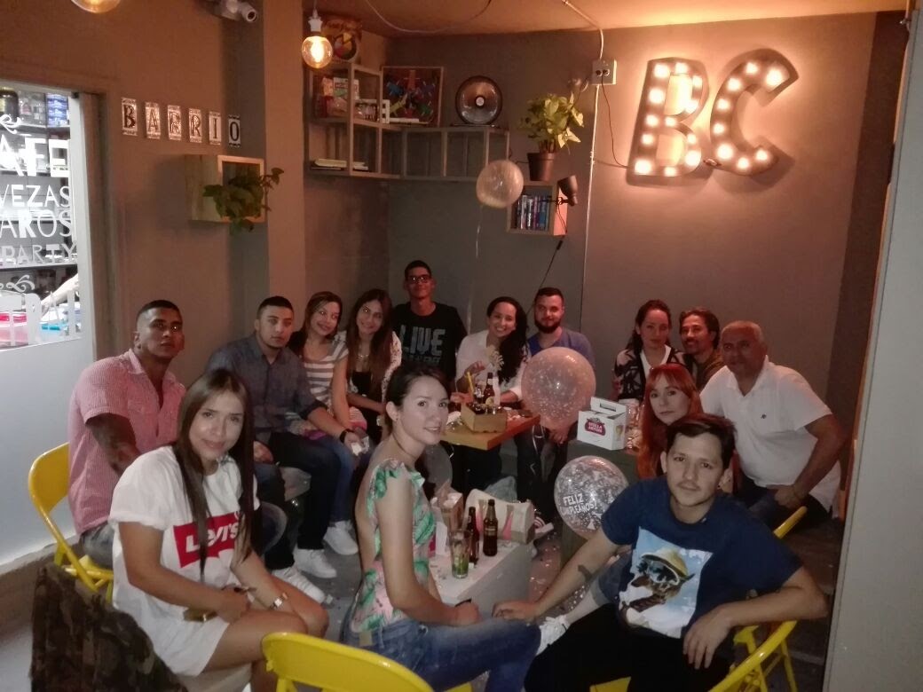 A group of friends enjoying the new lounge area at Barrio Central