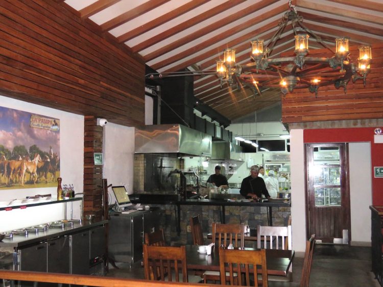 Inside La Pampa, second floor with kitchen and salad bar in Provenza