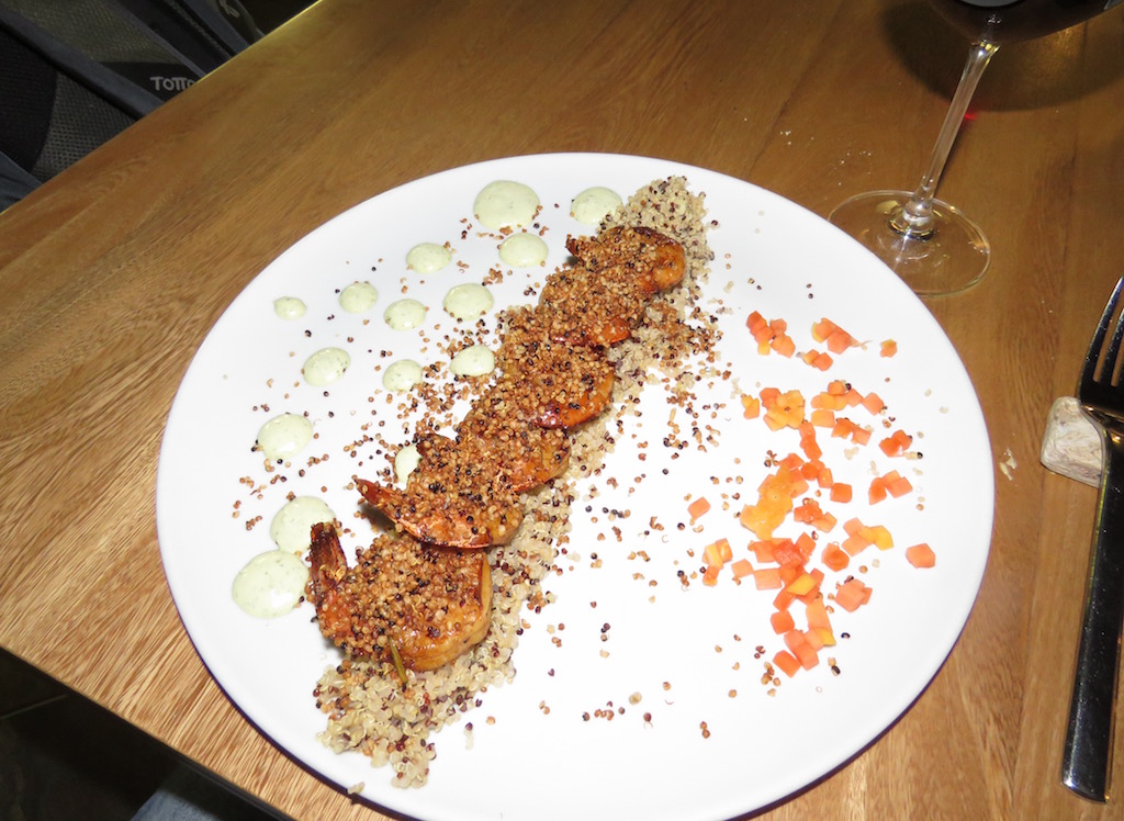 Shrimp with crispy quinoa soy sauce, cilantro and green papaya