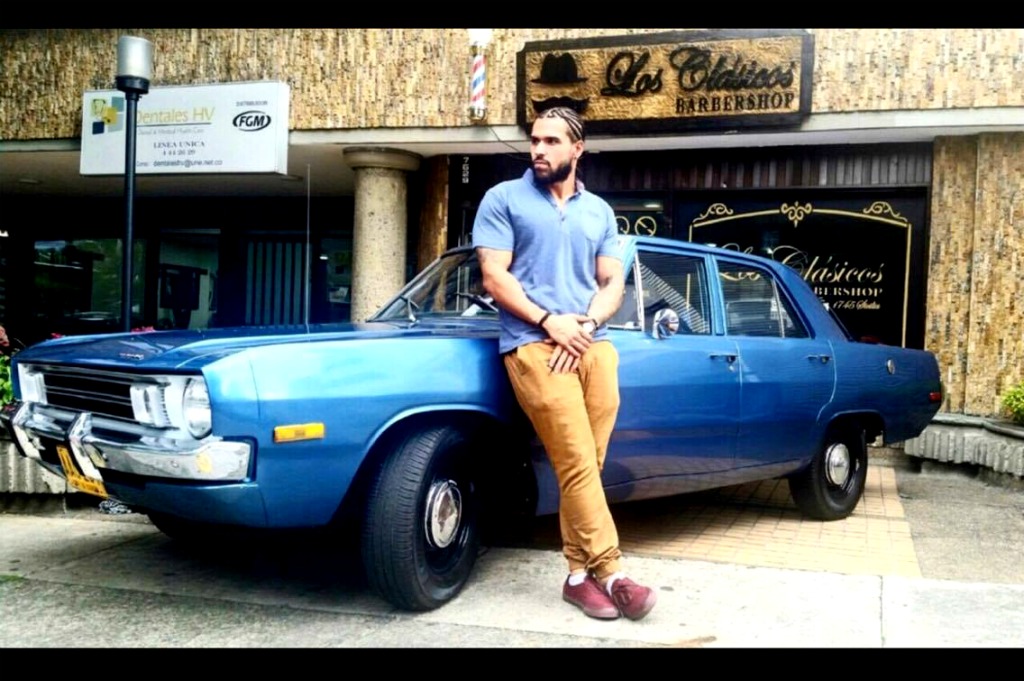 Danny, owner of Los Clásicos outside the Barber Shop.