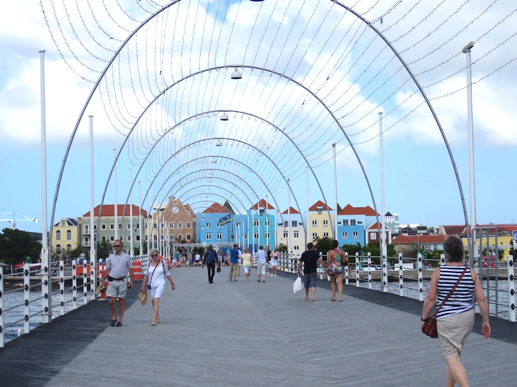 Walking across the Queen Emma Pontoon Bridge