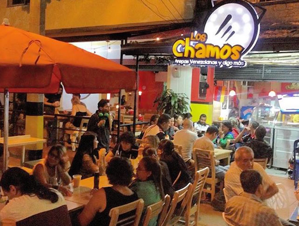 Los Chamos at night with sign