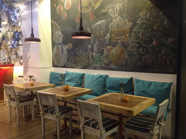 Comfortable seating and a decorative chalkboard