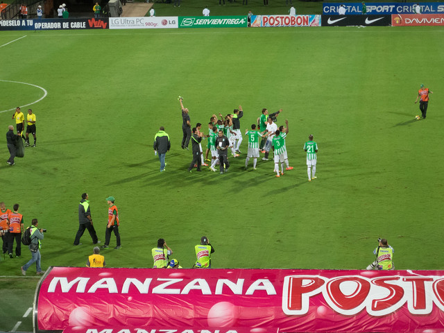 Nacional players and staff celebrate their semifinal victory