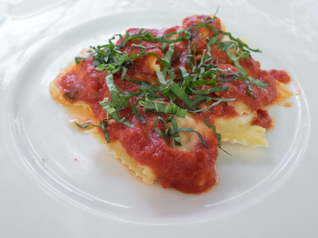 Ravioli with serrano ham, feta cheese and onion marmelade