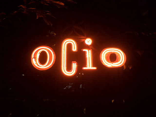 The red neon sign outside Ocio