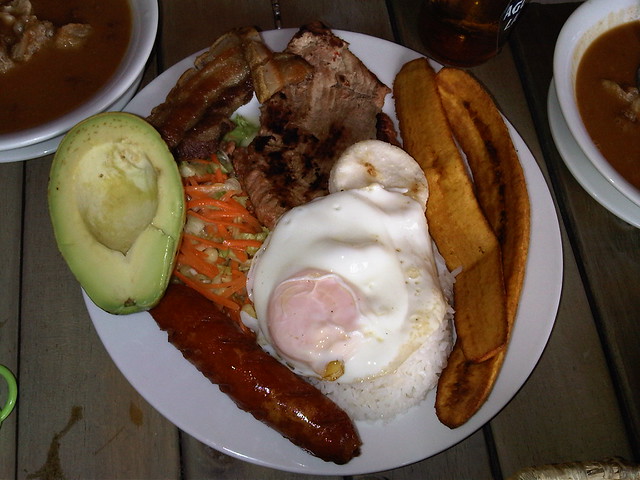 Bandeja Paisa is a regional Antioquian dish, heavy on the cholesterol and sodium. Bandeja Paisa is a regional Antioquian dish, heavy on the cholesterol and sodium.