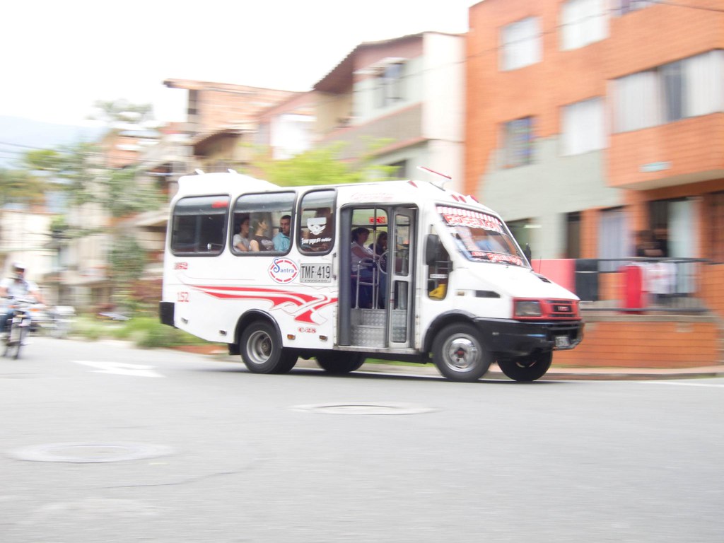 A little bus zips through town