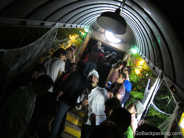 A chef poses at the entrance to El Cuervo discoteca.