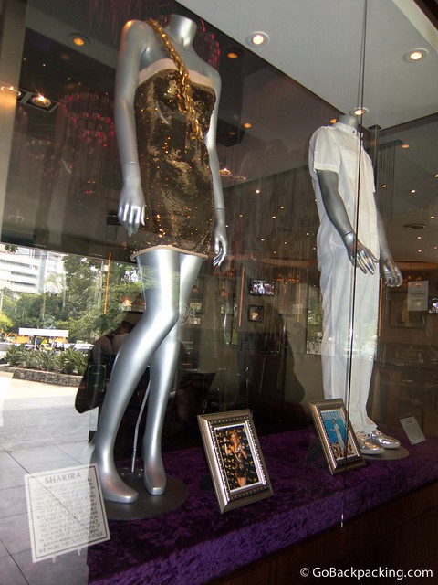 Shakira's gold dress A gold-sequined Shakira dress, and white outfit worn by Juanes, greet diners entering at the entrance of the Hard Rock Cafe Medellin