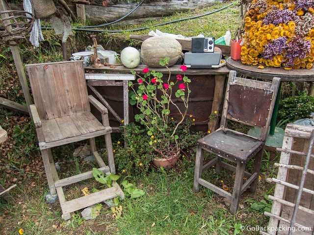Wooden chairs like the one on the left were used to carry the sick from Santa Elena to Medellin for treatment