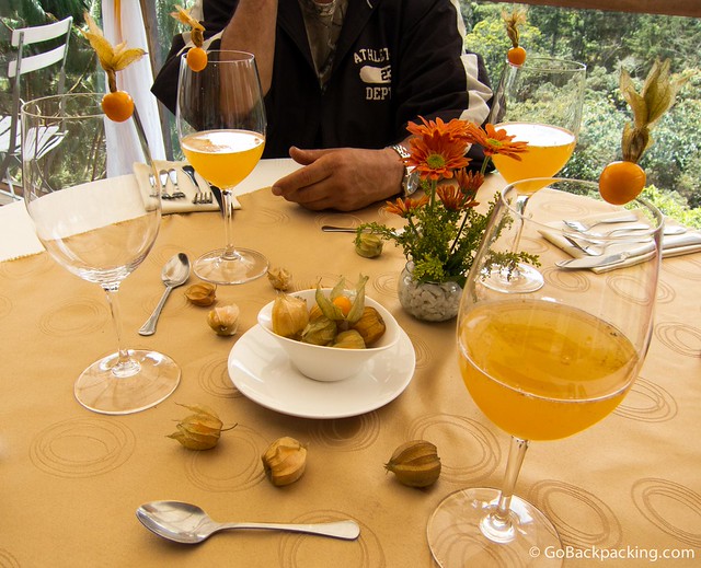 The signature cocktail is made of beer, uchuva juice, honey, and cardamom