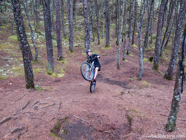 Juan Pablo pops a wheelie in the forest