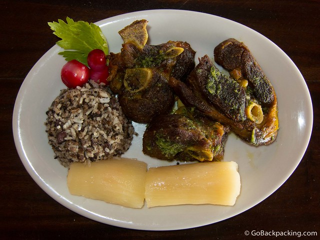 Chicamocha goat marinated with local herbs, and served with yucca, rice, and red hot onions
