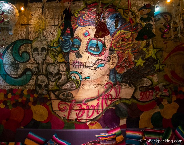 Artwork on a wall at the back of Tepito