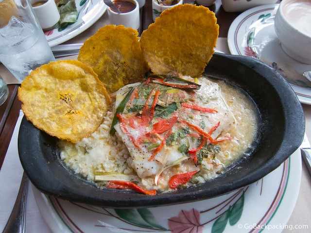 Robalo filet served over rice with a sour orange sauce, onions, sweet peppers, tomatoes, limoncillo and cilantro