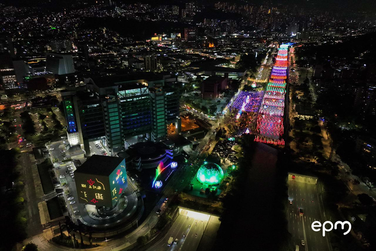 Aerial view of Medellín Christmas lights along the river during Alumbrados EPM